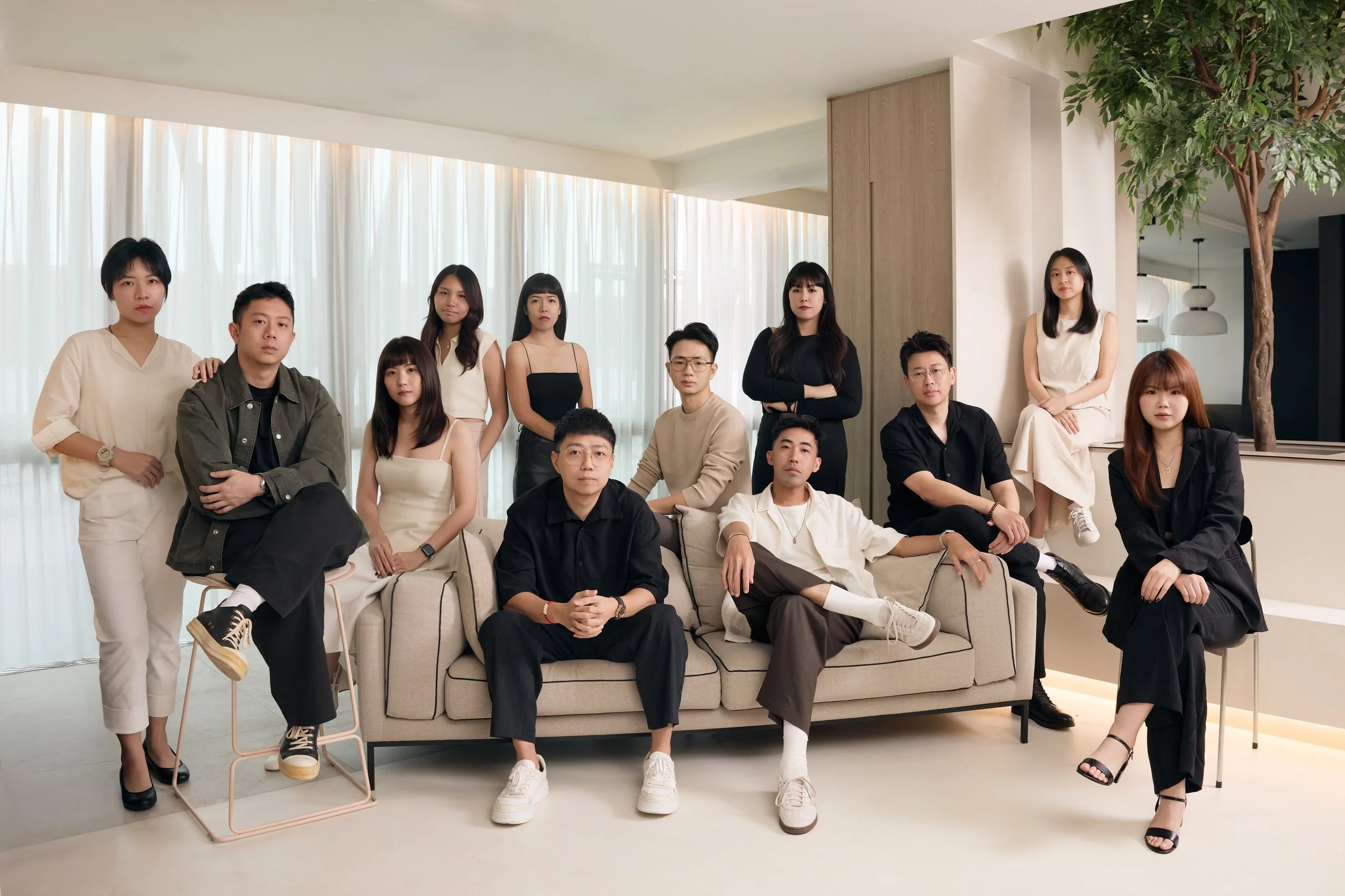 The HOFT Collective team together in a light-filled interior